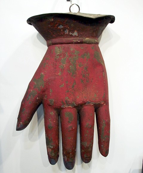 LARGE HAND IN OLD PAINT